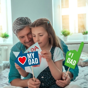 Father's Day photo booth props including My Dad sign and #1 Dad hand for party fun