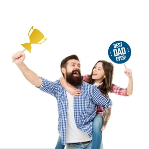 Father's Day photo booth props set with Best Dad Ever sign and gold trophy toppers