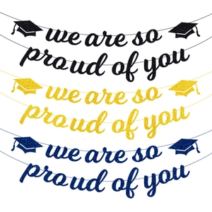 Glittery 'We Are So Proud of You' graduation banner set in black, gold and blue colors