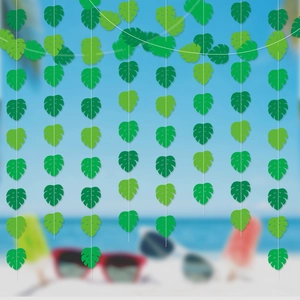 Tropical party banner with green monstera leaves hanging on string against beach background