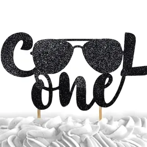 Black glitter Cool One cake topper with aviator sunglasses for 1st birthday party decor