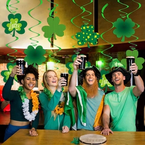 St. Patrick's Day party decorations featuring green clover swirls in a festive bar setting