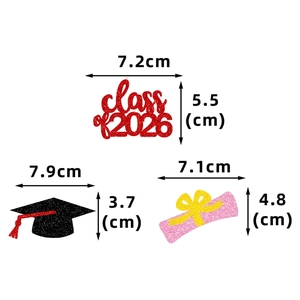 Detailed view of Class of 2026 glitter cake toppers with graduation cap and diploma