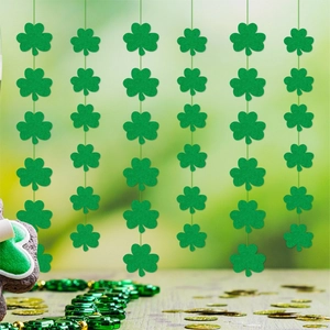 Glittering green shamrock garland banner for St. Patrick's Day party wall decorations