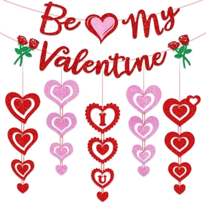Red glitter Be My Valentine banner and hanging heart garlands for party decor