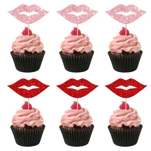Glittery lip-shaped cupcake toppers in red and pink for Valentine party cake decoration