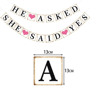Vintage wedding banner with HE ASKED SHE SAID YES text and pink heart decoration
