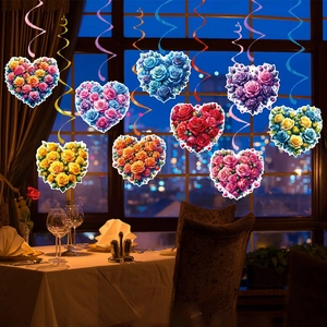 Valentine's Day hanging swirl decorations with colorful rose heart paper cutouts