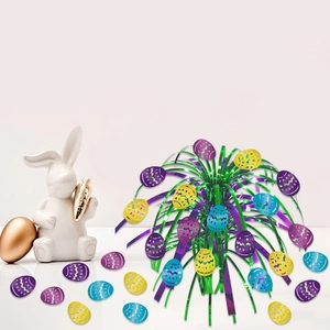 Close-up of Easter fountain centerpiece with colorful foil branches and egg ornaments