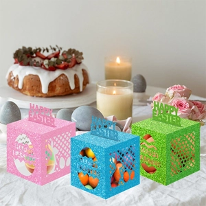 Three glittery Easter candy gift boxes with bunny and egg hollow designs