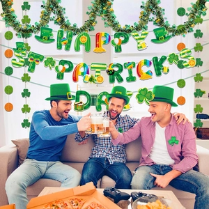 St. Patrick's Day decorations set with shamrock banner and green party favors in a home
