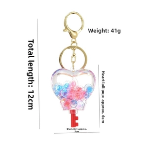 Detailed technical diagram of acrylic heart sand bottle keychain with size and weight specs