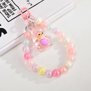 Pastel mermaid beaded keychain with iridescent resin pearls and pink clip charm