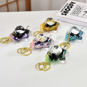 Set of five airplane quicksand liquid keychains with colorful glitters and sequins