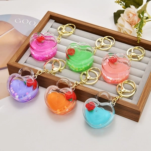 Creative heart-shaped liquid acrylic keychains with floating rose flower in six colors