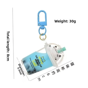 Detailed dimensions of blue cat bubble tea keychain with liquid and measurements