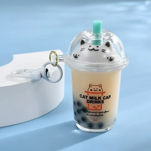 Creative bubble tea cup keychain with cute cat figurine and liquid quicksand effect