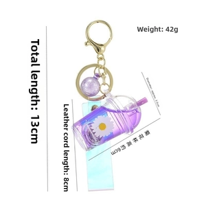 Detailed size parameters for the purple milk tea cup keychain featuring daisy patterns