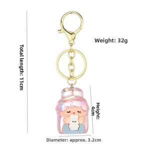 Detailed size map of cute pink cartoon girl keychain with dimensions 11cm length and 32g weight