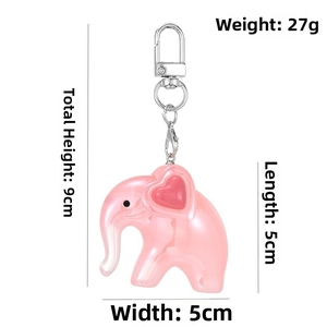 Pink acrylic elephant keychain detailed with heart ears, size 5x5cm, weighing 27g