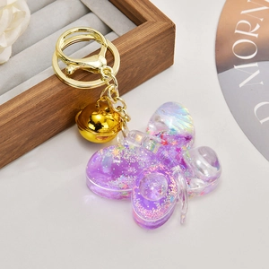 Sparkling purple resin butterfly keychain with gold bell and glitter for bag decoration