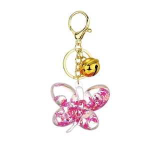 Pink butterfly acrylic oil keychain with liquid glitter stars and golden clasp