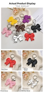 Detail view of acrylic bow keychain collection in various colors with metal heart charm