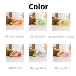 Six colors of acrylic glitter liquid sand keychains featuring cute cats and golden bells