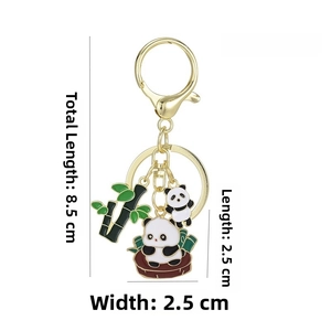 Detail showing panda and bamboo keychain dimensions: 8.5cm total length and 13.5g weight