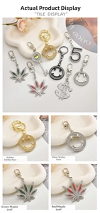 Detailed macro view of gold and silver plated keychain pendants with micro-pave crystals