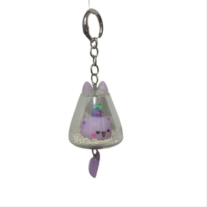 Cute purple cat acrylic keychain in bell-shaped container with tiny pearls and heart pendant
