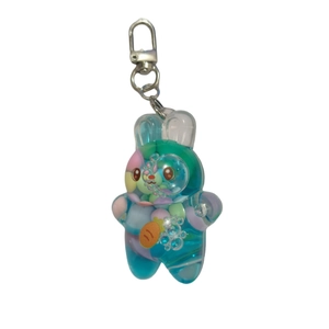 Cute bunny acrylic quicksand keychain with blue-green liquid and carrot detail