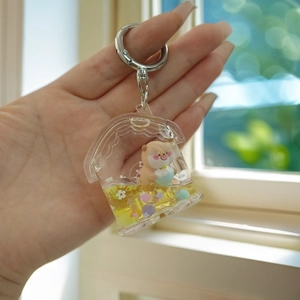 Cute panda panda liquid quicksand keychain in house-shaped acrylic holder with yellow oil
