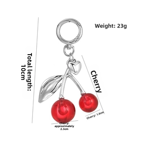 Detailed dimensions of cherry bag charm with red beads and silver leaf pendant