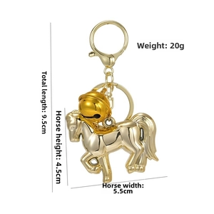 Polished gold horse keychain dimensions 5.5x4.5cm with bell and lobster clasp detail