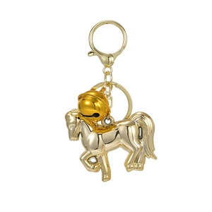 Golden metal horse keychain with a large round bell and standard circular ring fastener