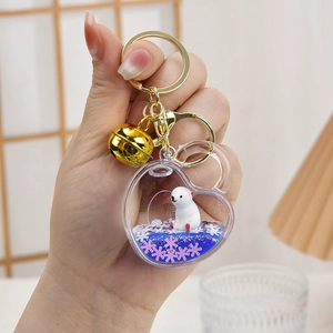 Portachiavi a forma di cuore con orso polare e glitter viola liquidi per borsa