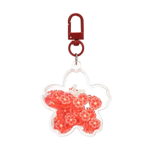 Luminous acrylic flower shaker keychain with red sequins and moving quicksand effect