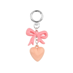Pink bow and orange heart charm keychain with silver spring ring clip for bags