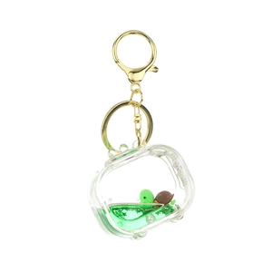 Cartoon turtle liquid quicksand keychain with green glitter and gold lobster clasp