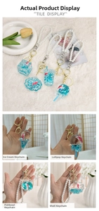 Detailed close-up of acrylic ocean liquid keychain featuring blue floating sea creatures