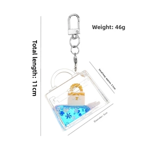 Detailed size specifications for a blue quicksand keychain in a mini handbag shape