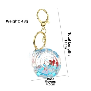 Macro shot of rose flow sand keychain showing 11cm length and 4.5cm diameter details