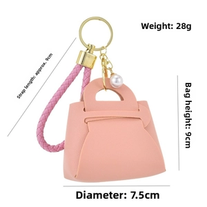 Rosa Mini-Geldbörse Schlüsselanhänger mit Perlen und Maßen von 9x7,5cm für Taschen