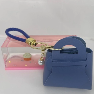 Mini blaue PU-Leder-Geldbörse Schlüsselanhänger mit Flechtseil und Perlenanhänger