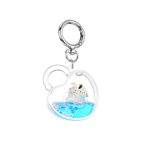 Porte-clés cœur en sable mouvant bleu avec figurines d'animaux et anneau argenté