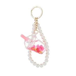 Cute acrylic bubble tea cup keychain with pink liquid and beaded pearl wristlet