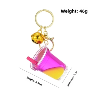 Detail view of acrylic milk tea cup keychain with liquid quicksand and 6.5cm height dimension