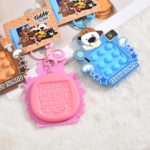 Teddy Island cartoon keychain set with colorful silicone pop-it charms and branded cards