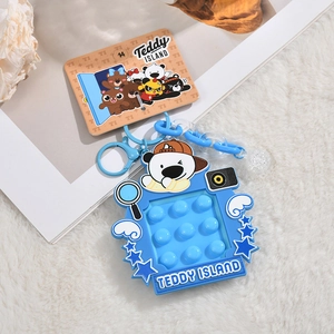 Teddy Island blue camera silicone keychain with cute bear mascot and original packaging